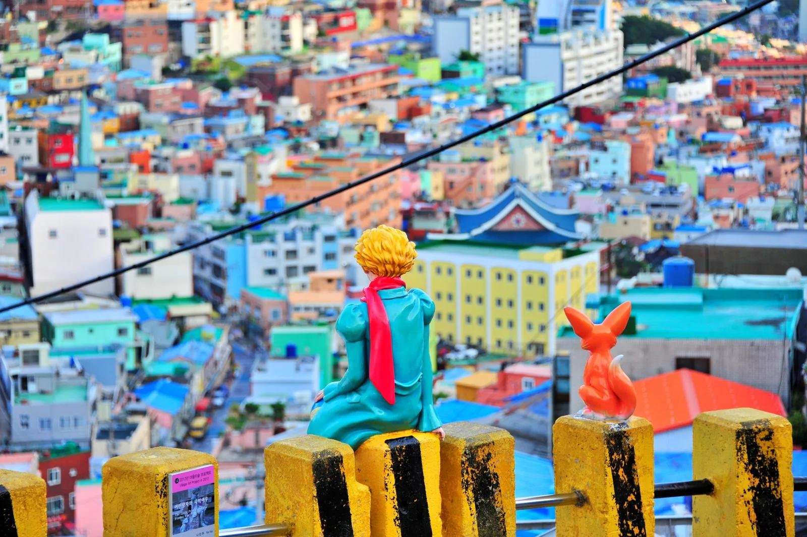 Little Prince and Desert Fox statue overlooking colorful houses at Gamcheon Culture Village Busan
