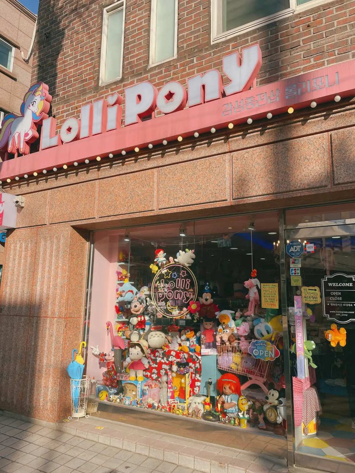 Cute and colorful boutique gift and toy shop window in Yeonnam-dong Hongdae