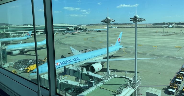 Korean Air aircraft at Incheon International Airport viewed through the terminal windows