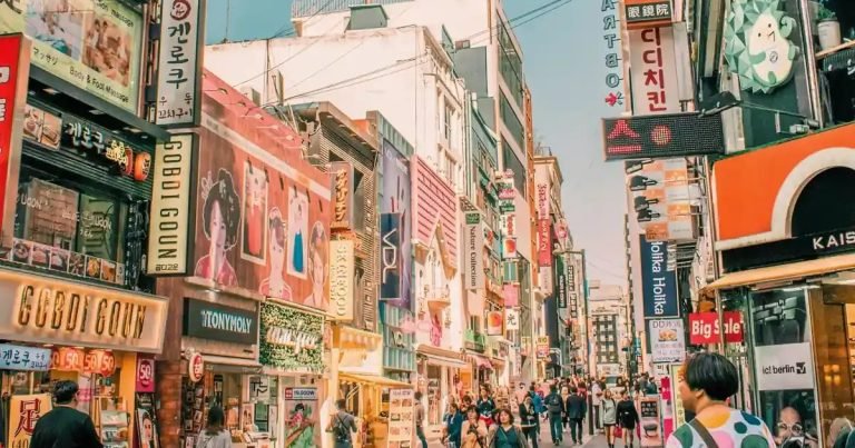 Where to stay in Seoul neighborhood guide featuring Myeongdong shopping street