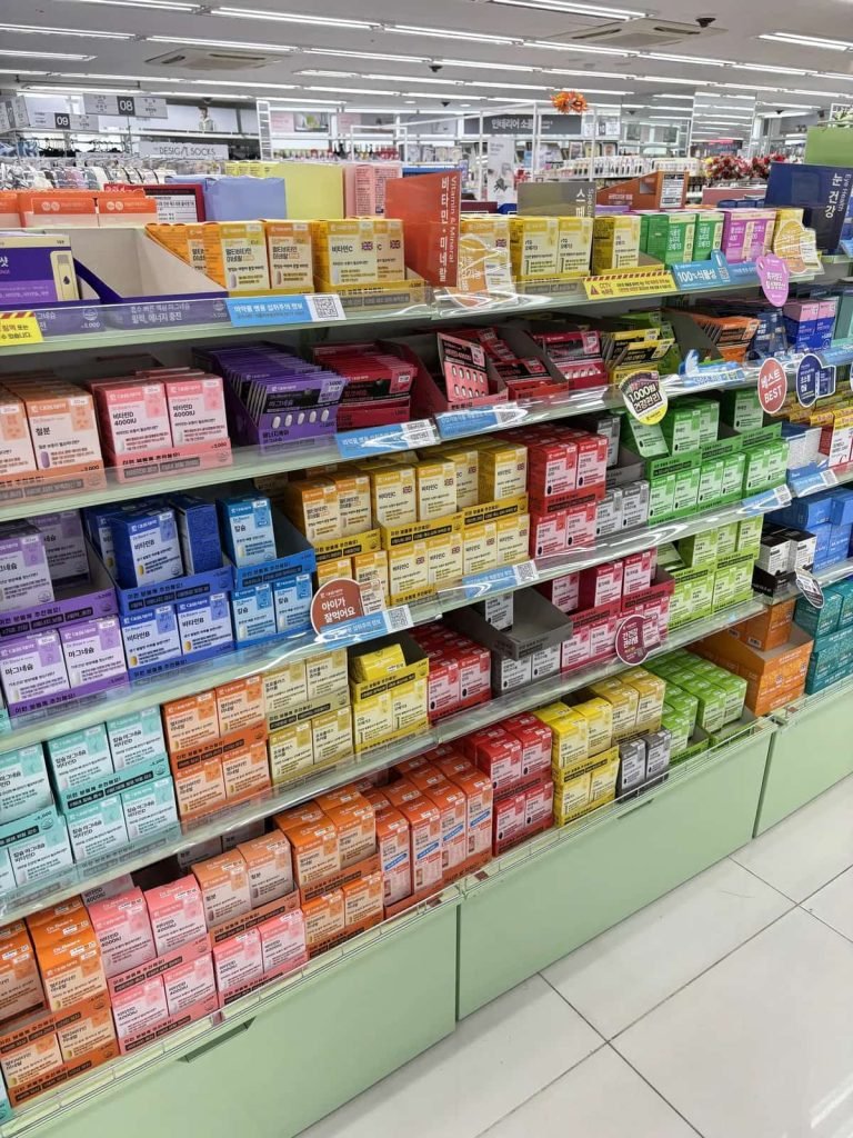 Daiso Korea personal-care shelves with skincare and beauty products.