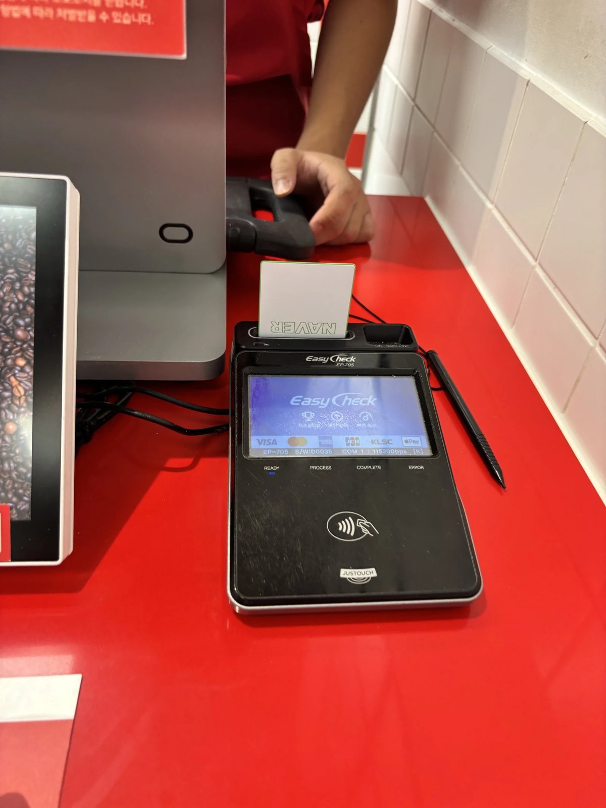 Contactless card terminal at a checkout counter in Korea