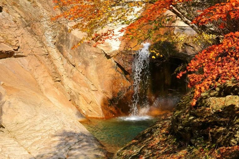 Autumn foliage and waterfall in Seoraksan National Park