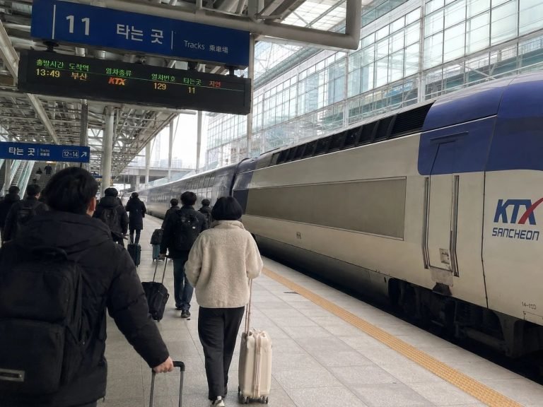 KTX train at Seoul Station platform for travelers going from Seoul to Busan