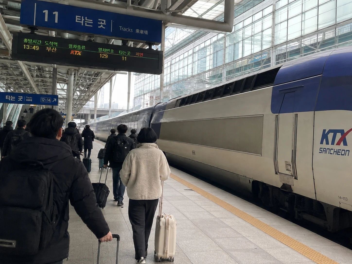 KTX train at Seoul Station platform for travelers going from Seoul to Busan